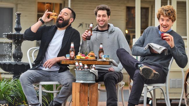 Geoff Machirus, Carlo Cosner and Shane Eddison tuck into their Guy Tea at The Stables at Como. Picture: Tony Gough