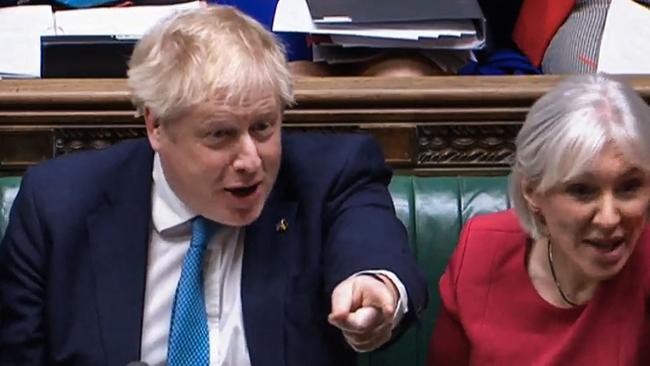 Boris Johnson and supporter Nadine Dorries, who has called the investigation a witch-hunt. Picture: various sources / AFP