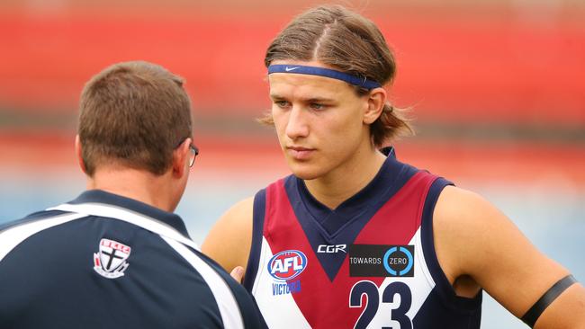 Devlin Brereton, the son of Hawthorn champion Dermott Brereton, listens to a Sandringham Dragons coach. (Photo by Michael Dodge/AFL Media/Getty Images)