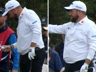 British Open champion Shane Lowry has lashed out at a cameraman after a loss of focus on the 11th hole cost him the outright lead at Royal Troon on Friday.