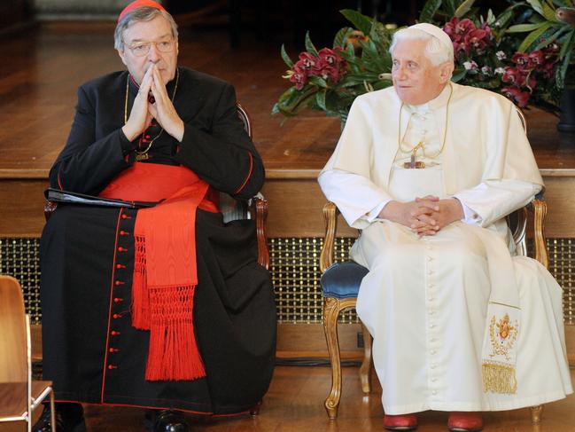 Pope Benedict XVI, right, looks towards Cardinal George Pell at an interfaith meeting during World Youth Day festivities, in Sydney, July 2008. Picture: AP Photo/William West