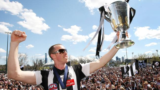 Premiership captain Nick Maxwell shows the 2010 cup off to the Magpie faithful.