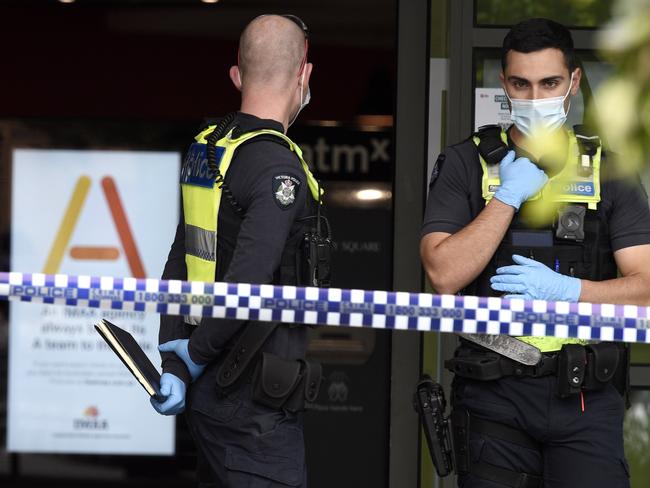 Police surround the shopping centre after the incident. Picture: Andrew Henshaw