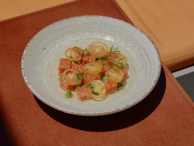 Cured salmon with tomato and Geraldton wax ceviche, avocado, and black habanero oil from Lottie. Picture: Supplied
