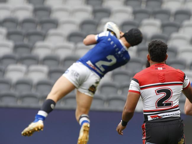 Tom Rodwell takes flight for the Jets. Picture Warren Gannon Photography