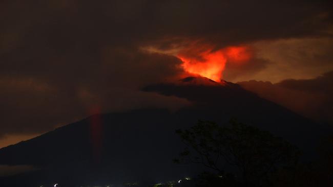 A pre-dawn view shows the erupting Mount Agung volcano in November. Picture: Sonny Tumbelaka