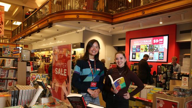 Dymocks book store employee Stephanie Thelin with customer Nicole Ellery in Sydney. Picture: Britta Campion / The Australian