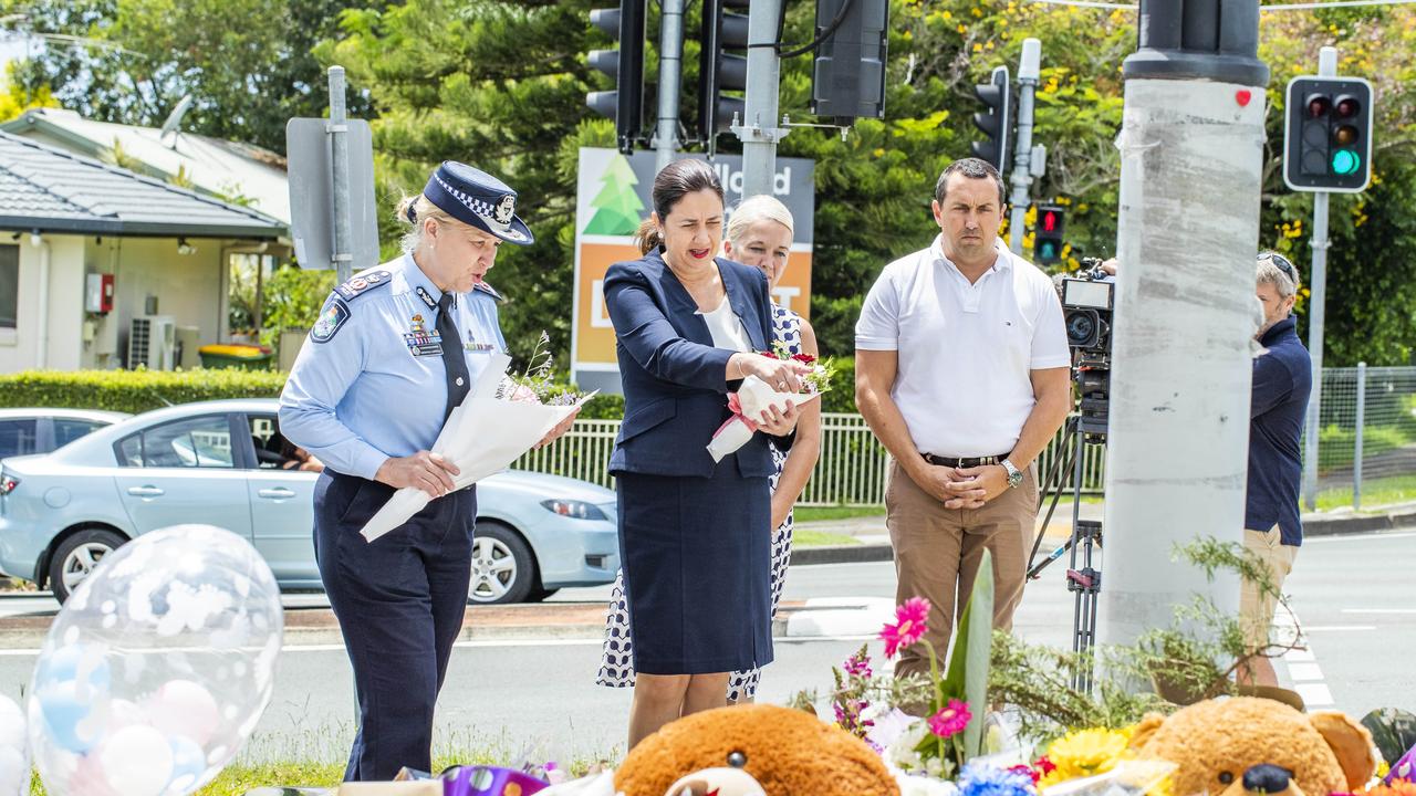 Queensland Premier Annastacia Palaszczuk and Queensland Police Service Commissioner Katarina Carroll lay flowers for Kate Leadbetter and Matty Field. Picture: Richard Walker