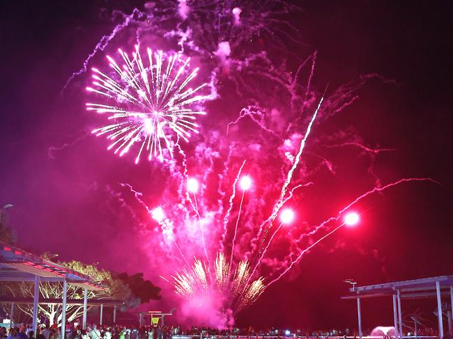 Fireworks light up the sky over the Cairns Esplanade Lagoon at the conclusion of the Cairns Festival Grand Parade, held along the Esplanade on Saturday evening. Picture: Brendan Radke