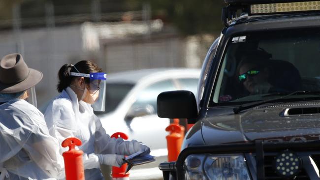 Queensland Health workers test locals in Blackwater for COVID-19 in the days after Nathan Turner’s death. Picture: Steve Vit