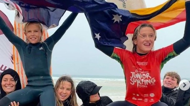 Coffs Harbour brothers Luca and Will Martin are chaired up the beach at Phillip Island after winning the 2023 MR Shield for 16 years and under at the Australian Junior Surfing Titles at Phillip Island.