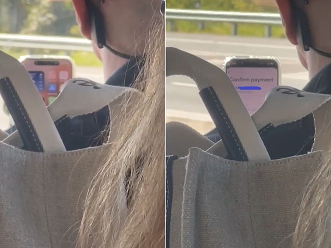 Bus driver uses phone on Gateway motorway.