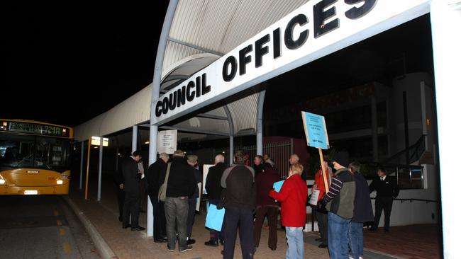 Ratepayers protest against a proposed pay rise for the chief executive of the Onkaparinga Council. 