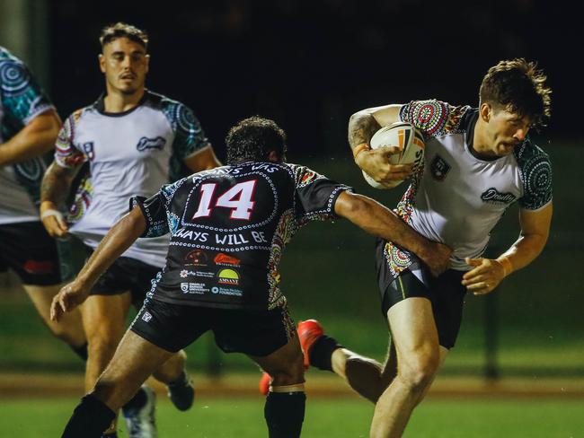 Territory All Star Tyrone Jennings charging forward in the representative fixture against Indigenous All Stars. Picture Glenn Campbell