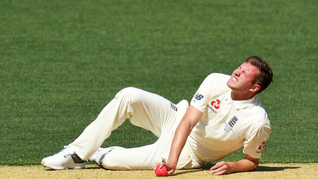 Jake Ball grimaces in pain after injuring his ankle in England’s second Tour match.