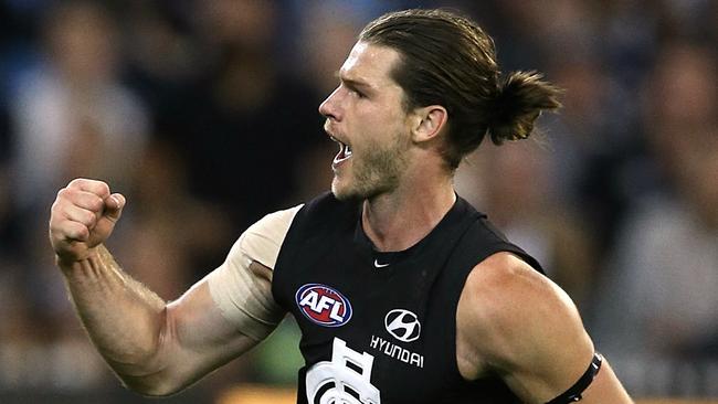 Bryce Gibbs and his man-bun celebrate a goal. Picture: Wayne Ludbey