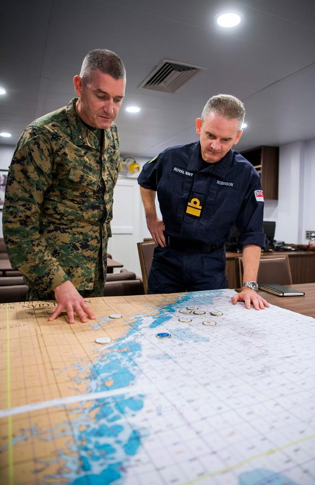 Brigadier General Jason Bohm, US Marine, and Rear Admiral Guy Robinson, Royal Navy, map movements in the Norwegian Sea outside Trondheim, Norway during Trident Juncture 2018. Picture: AFP