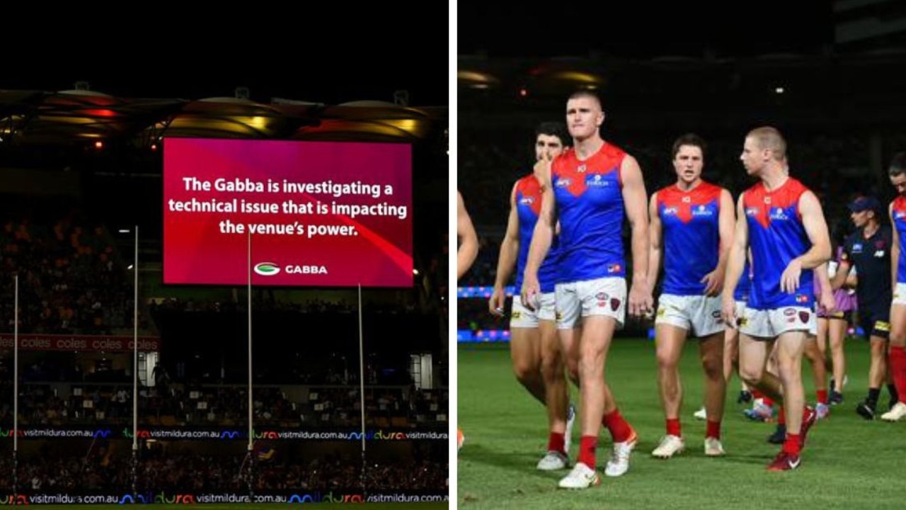 AFL game suspended after Gabba power outage in bizarre scenes