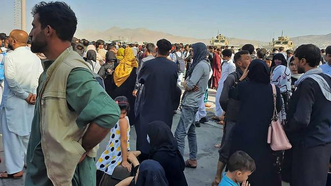 Afghans crowd at Kabul airport in an effort to flee the country. Picture: AFP