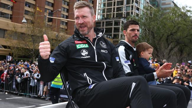 Nathan Buckley and Scott Pendlebury during the Grand Final Parade.