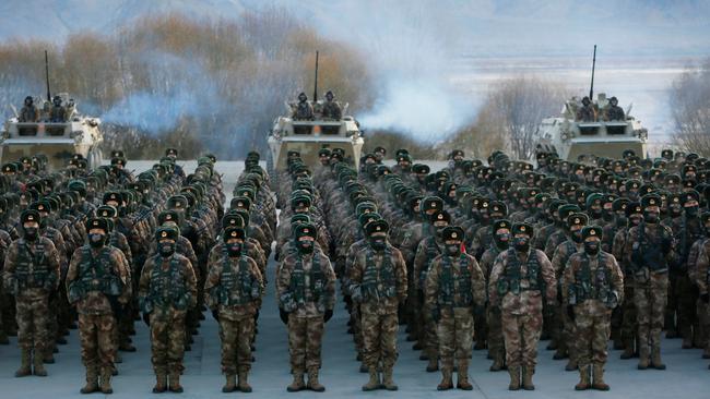 The hinese People's Liberation Army (PLA) soldiers assembling during military training at Pamir Mountains in Kashgar, northwestern China's Xinjiang region. Picture: STR / AFP