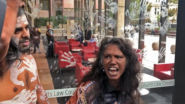 Angry protests erupted outside court following the dismissal. Picture: Lucy Hughes Jones