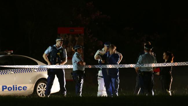 Police at the scene of the fatal shooting. Picture: Bill Hearne