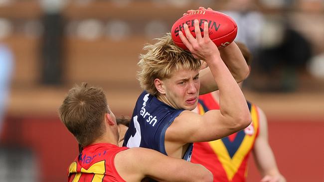 ADELAIDE, AUSTRALIA - June 30: Jesse Dattoli of Victoria Metro and Ned Atkinson of South Australia during the 2024 Marsh AFL Championships U18 Boys match between South Australia and Victoria Metro at Alberton Oval on June 30, 2024 in Adelaide, Australia. (Photo by Sarah Reed/AFL Photos via Getty Images)