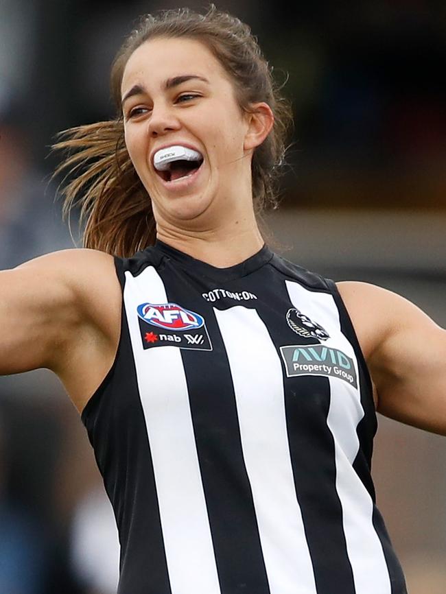 Collingwood star Chloe Molloy celebrates a goal.