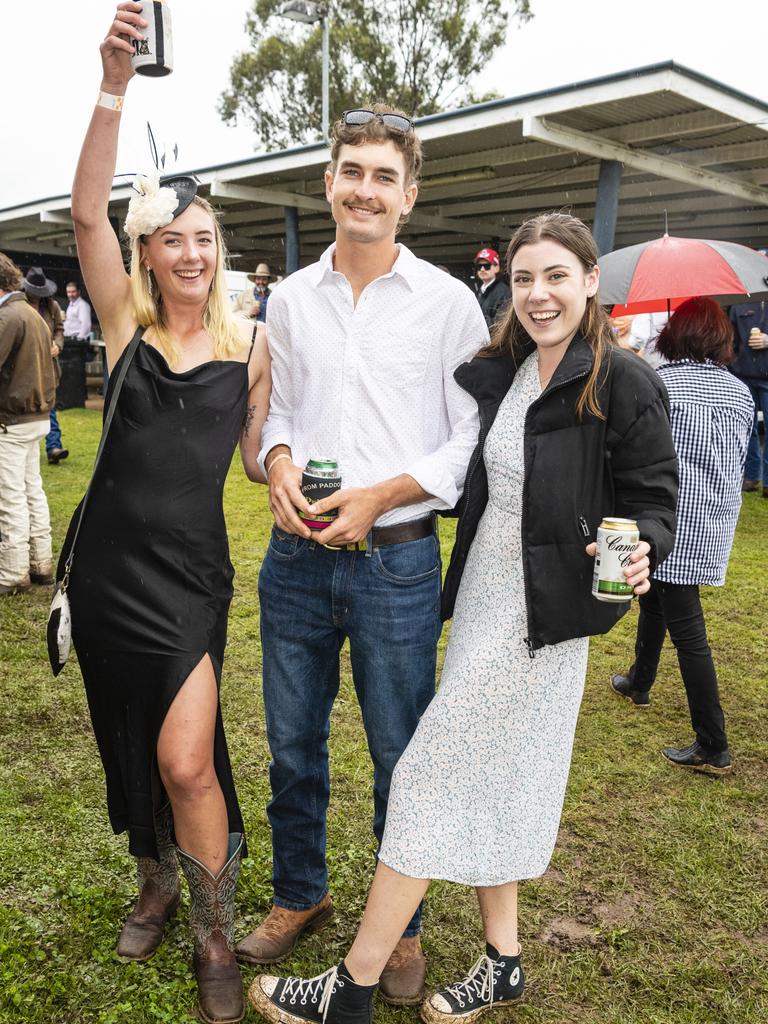 At the Clifton Jockey Club Clifton Cup races are (from left) Emily Bell, Jacob Draper and Emma Fuller, Saturday, October 22, 2022. Picture: Kevin Farmer