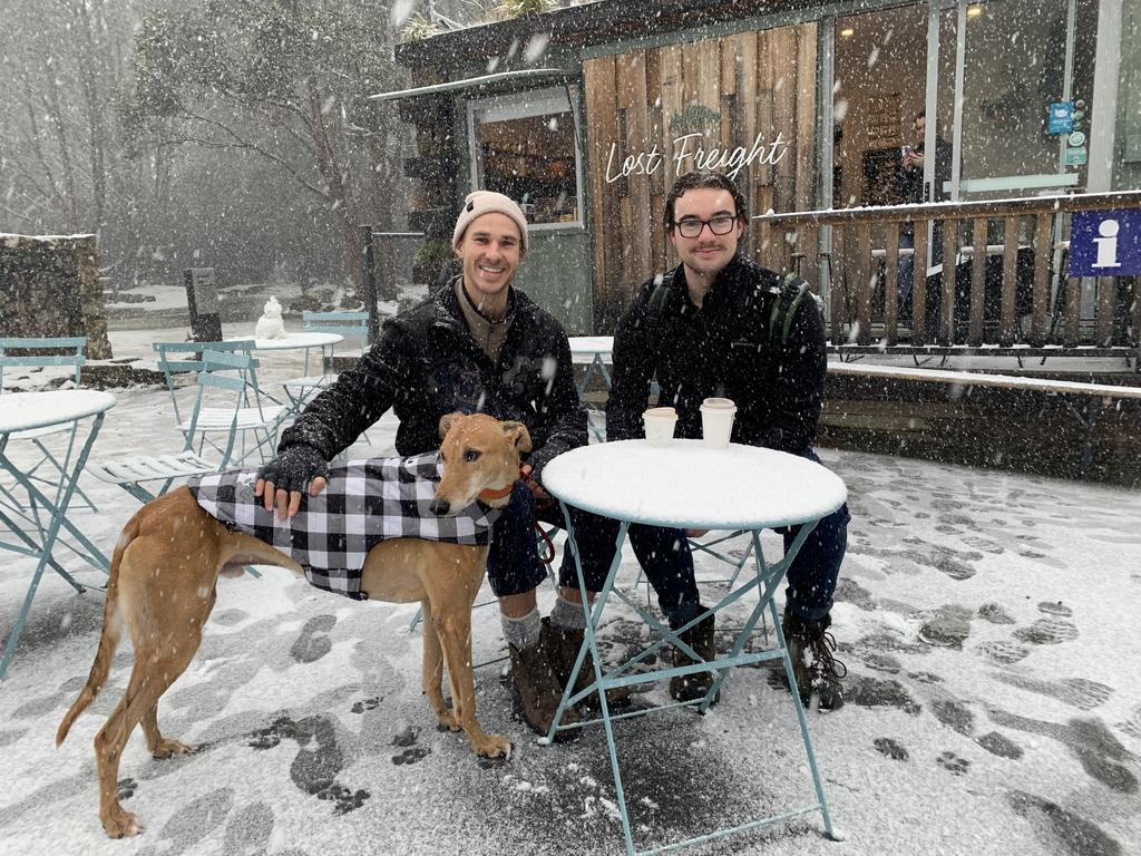 Stanley Gant and Cameron Crawford enjoy a coffee in the snow on kunanyi/Mt Wellington on June 7 2022