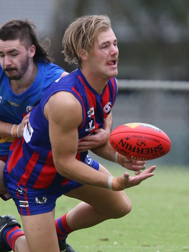 Football GDFL: Belmont Lions v Bell Post Hill Bell Post Hill 17 Will Ford handballs Picture: Mark Wilson