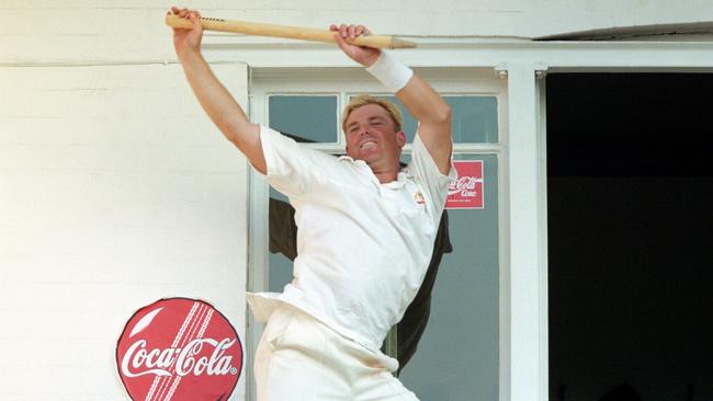 Shane Warne of Australia celebrates victory by dancing with a stump on the dressing room balcony after victory over England in the Fifth Ashes Test Match at Trent Bridge in 1997