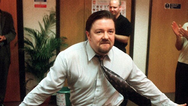 Actor Ricky Gervais as David Brent dancing in the TV show 'The Office'.