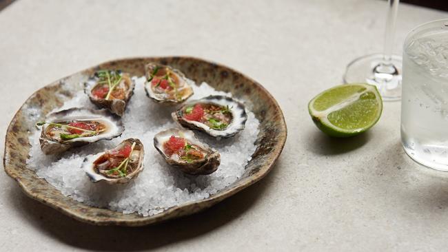 Longrain’s Sydney rock oysters with finger lime dressing.