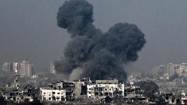 A picture taken from near the southern Israeli city of Sderot on October 28 shows smoke raising during an Israeli air strike in the northern Gaza Strip. Picture: Aris Messinis / AFP