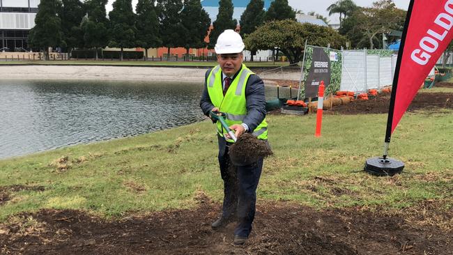 Gold Coast Mayor Tom Tate turns the first sod on the 'green bridge'. Picture: Andrew Potts