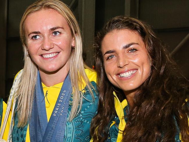 SYDNEY, AUSTRALIA : NewsWire Photos- AUGUST 14 2024;  l-r Athletes Lani Pallister, Noemi Fox, Ariarne Titmus, and Jessica Fox. The Australian Olympic Team with Jess Fox  arrives home into Sydney on Qantas from Paris and is greeted with a special welcome home ceremony with Prime Minister Anthony Albanese, Qantas Group CEO Vanessa Hudson, Chef de Mission Anna Meares and athletes' families with a special performance by Jessica Mauboy at Sydney airport. Picture: NewsWire / Gaye Gerard