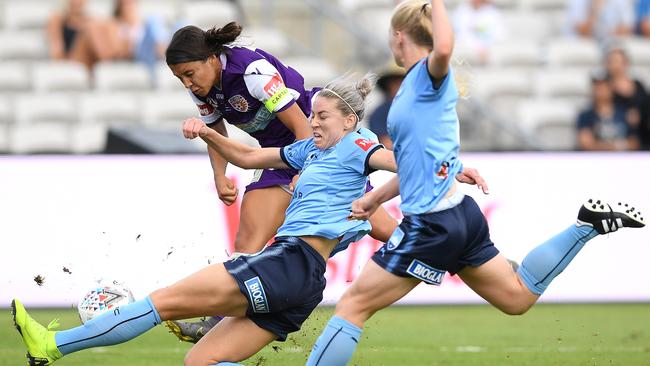 Perth Glory’s Sam Kerr is tackled by Sydney FC’s Alanna Kennedy during the W-League grand final on Saturday. Picture: AAP 