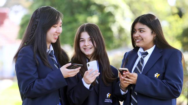 Westall Secondary College students Monineath Seang, Zoi Spiliopoulou and Malaya Dudek, who are going to the You Are Not Your Face debate. Picture: Aaron Francis