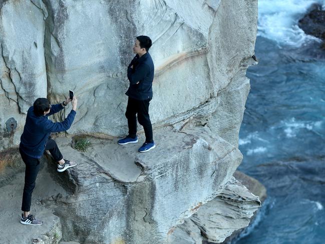 Waverley Council are still considering how to stop people climbing the fence at Diamond Bay to take insta-worthy photos. Picture: Damian Shaw