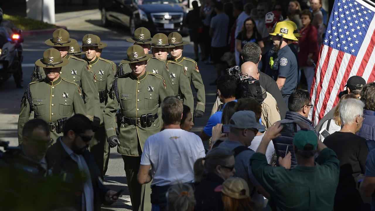 The body of Ventura County Sheriff's Department Sgt. Ron Helus is transported from the Los Robles Regional Medical Center in Thousand Oaks. Picture: AP