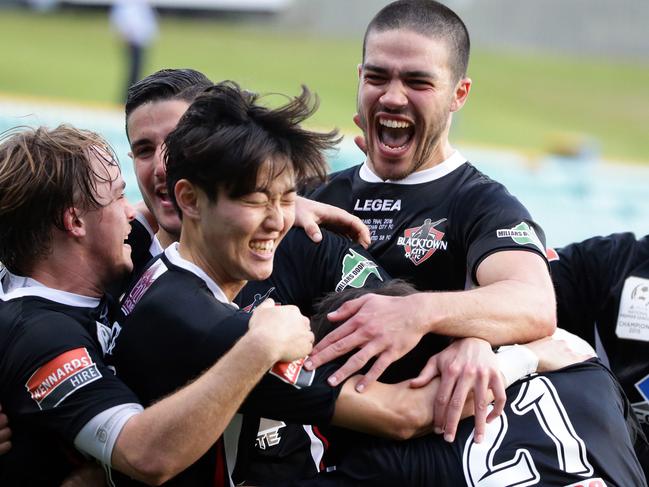 Blacktown FC players celebrate Danny Choi's second goal - Premier League grand final - Blacktown City FC vs Sydney United at Leichhardt Oval. Picture: Craig Wilson