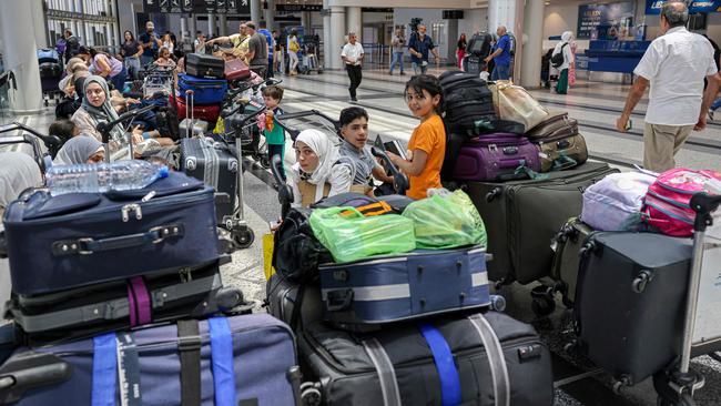 Passengers try to leave Beirut as war looms. Picture: AFP.