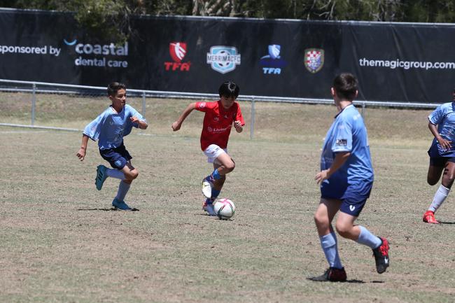 The Premier Invitational football tournament on the Gold Coast. Gold Coast Knights Red v Springfield United under-13s in action. Picture: Mike Batterham.