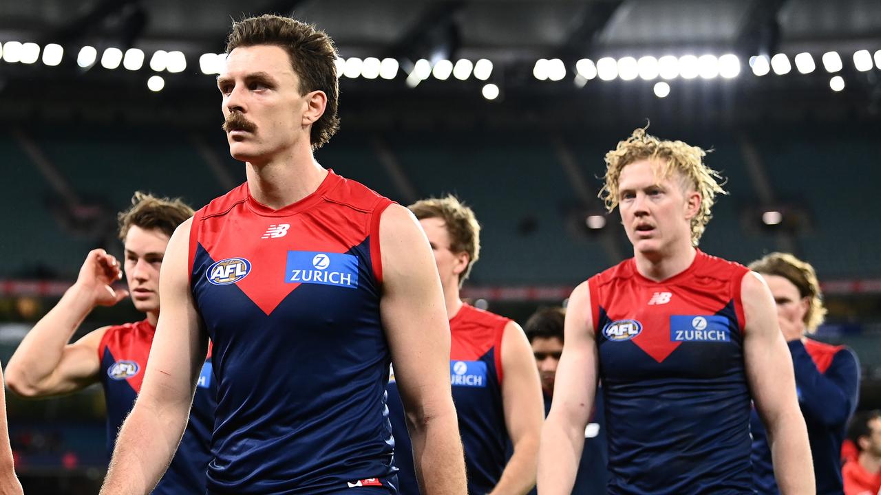 MELBOURNE, AUSTRALIA - JUNE 04: Jake Lever and his Demons team mates look dejected after losing the round 12 AFL match between the Melbourne and Sydney. (Photo by Quinn Rooney/Getty Images)