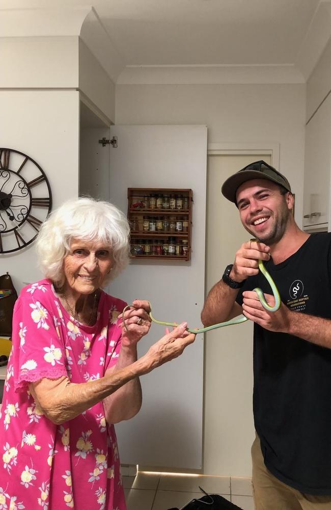 Rhona Breeze, 87, from Hope Island needed to get the snake catcher in to remove a green tree snake from her kitchen pantry. Photo: Cheryl Clarke