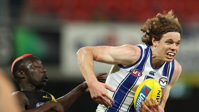 Richmond vs North Melbourne at Metricon Stadium, Gold Coast. 18/07/2020. Ben Brown of the Kangaroos marks infant of Mabior Choi of the Tigers. Pic: Michael Klein