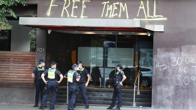 Police keep watch on a Hotel in Carlton where Novak Djokavic is being held