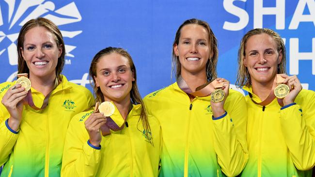 Emily Seebohm, Georgia Bohl, Emma McKeon and Bronte Campbell of Australia during the medal ceremony for the Womens 4x100m Medley Relay Final (AAP Image/Darren England)